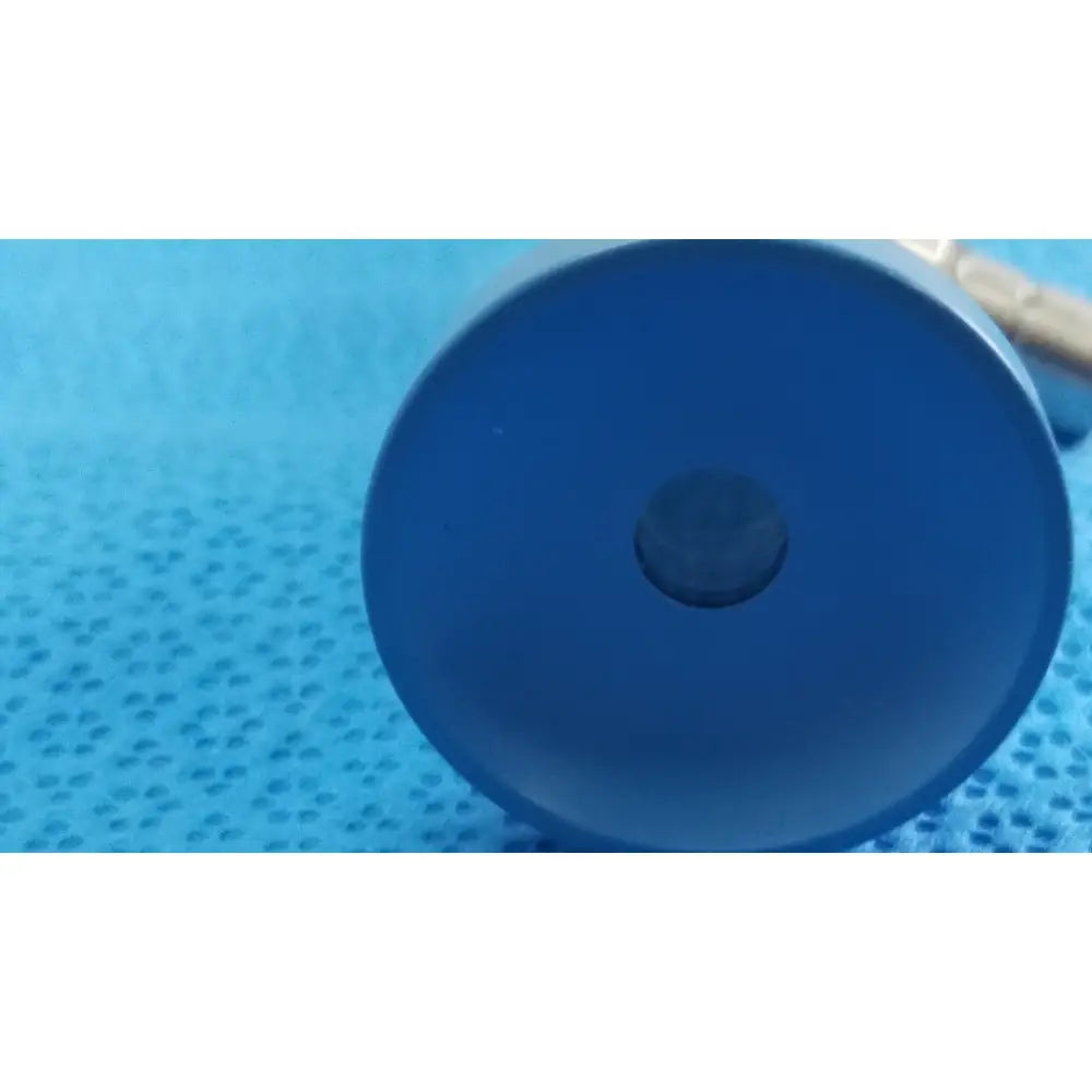 Blue plastic cylindrical ideal eyes 10mm autoclavable medical component with central hole for surgical use