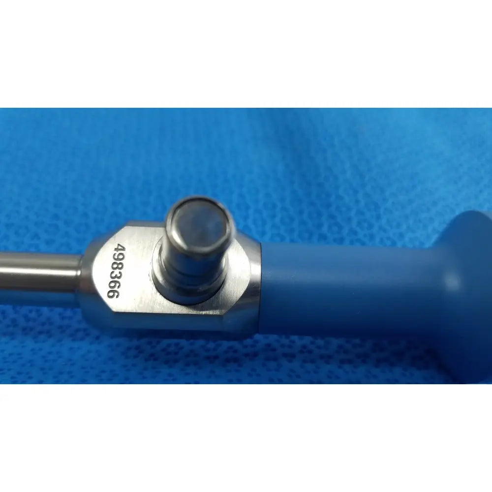 Blue-handled ideal eyes 10mm surgical instrument with metallic hexagonal joint and serial number 498366
