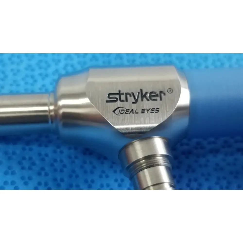 Stryker ideal eyes 10mm surgical instrument with polished stainless steel head and blue ergonomic handle autoclavable with trey