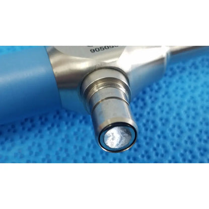 Silver metallic stryker ideal eyes 10mm surgical instrument with blue plastic handle and engraved serial number