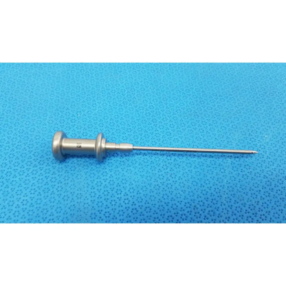Silver stainless steel trocar surgical orthopedic instrument with slender pointed tip and textured handle for precision use