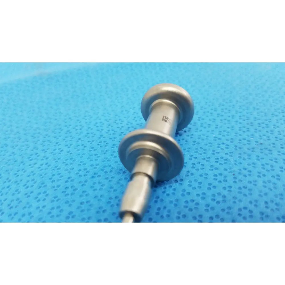Stainless steel trocar surgical orthopedic instrument with polished cylindrical handle and two circular flanges by Stryker