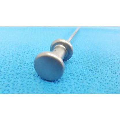 Silver metallic trocar surgical orthopedic instrument with rounded textured handle and slender shaft by stryker