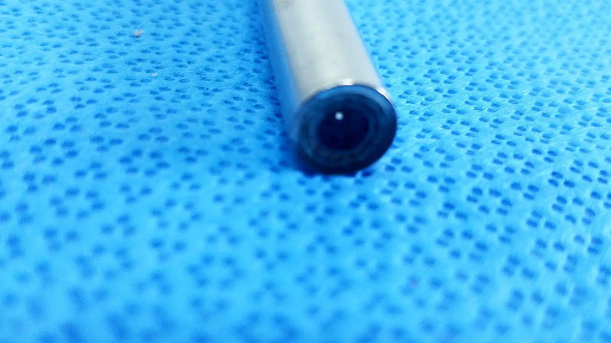 A sleek metallic 10mm 0° autoclavable endoscope with polished silver exterior for reuse medical applications