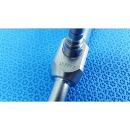 Silver metallic 10mm 0° autoclavable endoscope with hexagonal flange and serial number 357770 for reuse medical use