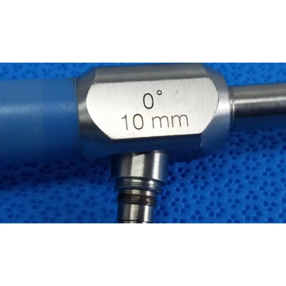 Silver metallic stryker 502-457-010 10mm 0° autoclavable endoscope with blue handle and engraved reuse medical markings