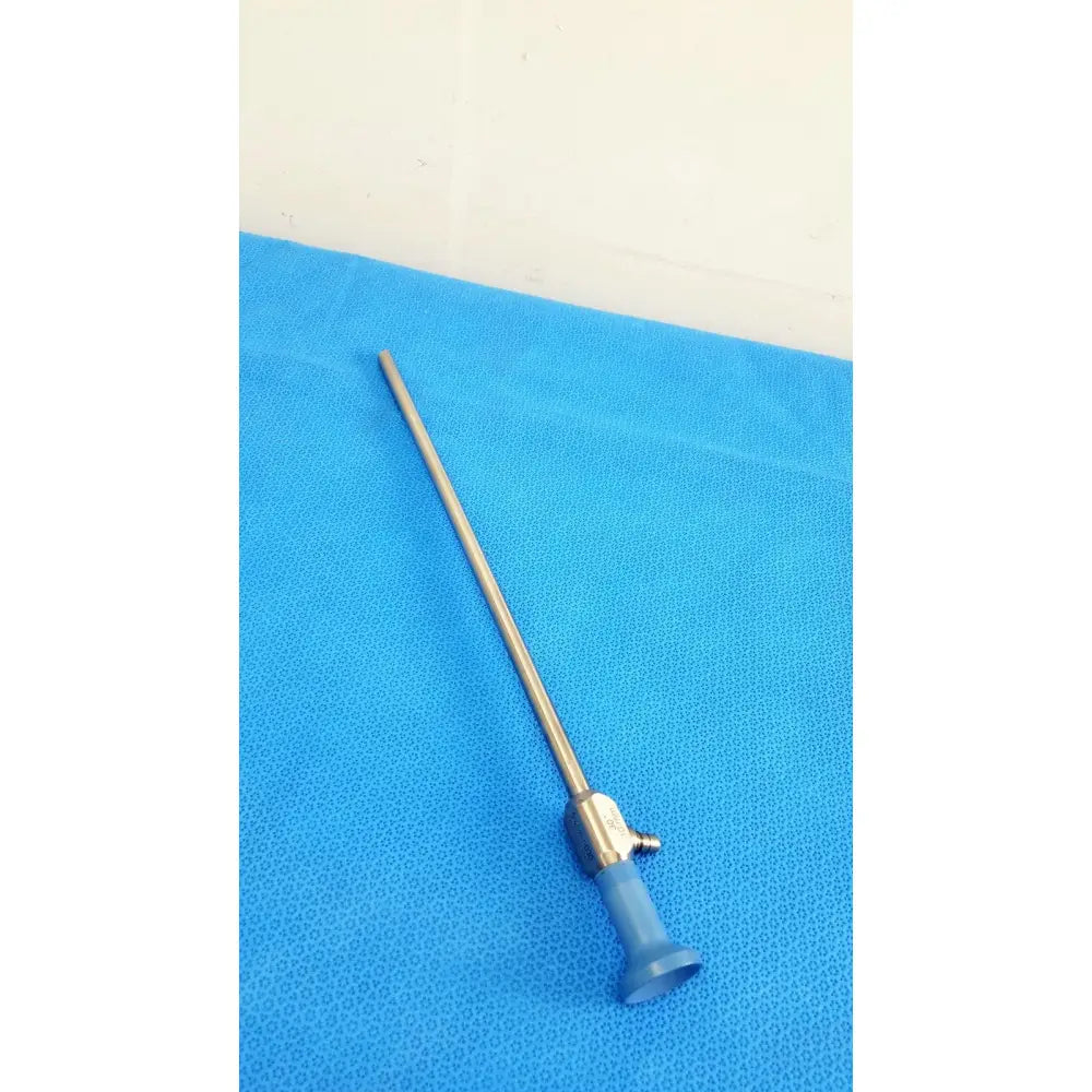 Silver stryker 502-457-030 10mm 30° autoclavable endoscope with blue ergonomic handle and metallic joints