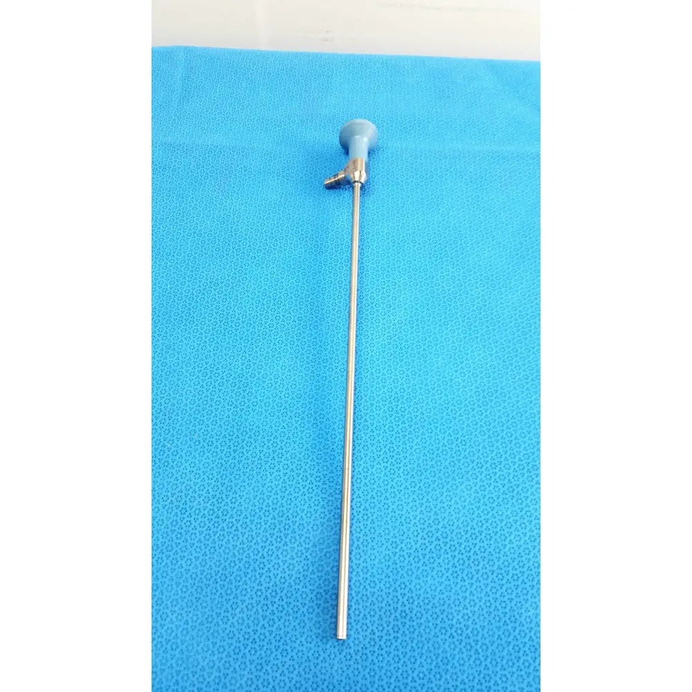 Silver surgical instrument with blue plastic handle and metallic shaft from stryker ideal eyes 5mm autoclavable endoscope