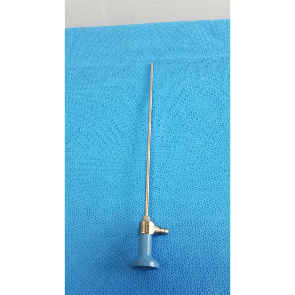 Silver surgical endoscope with blue plastic handle and brass fittings stryker ideal eyes 5mm autoclavable endoscope