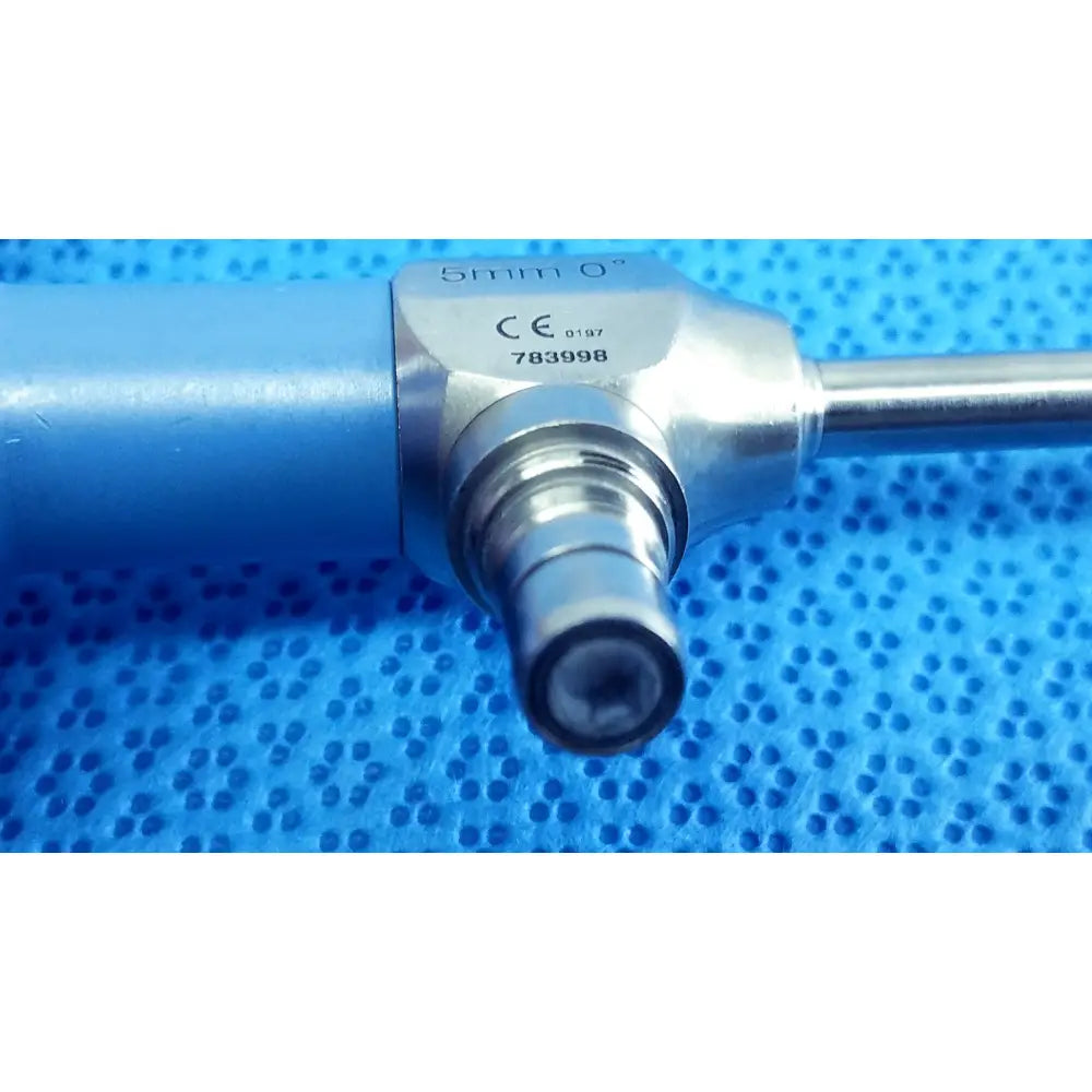 Silver surgical endoscope with blue handle and metallic connector marked 5mm 0 ideal eyes 5mm autoclavable version