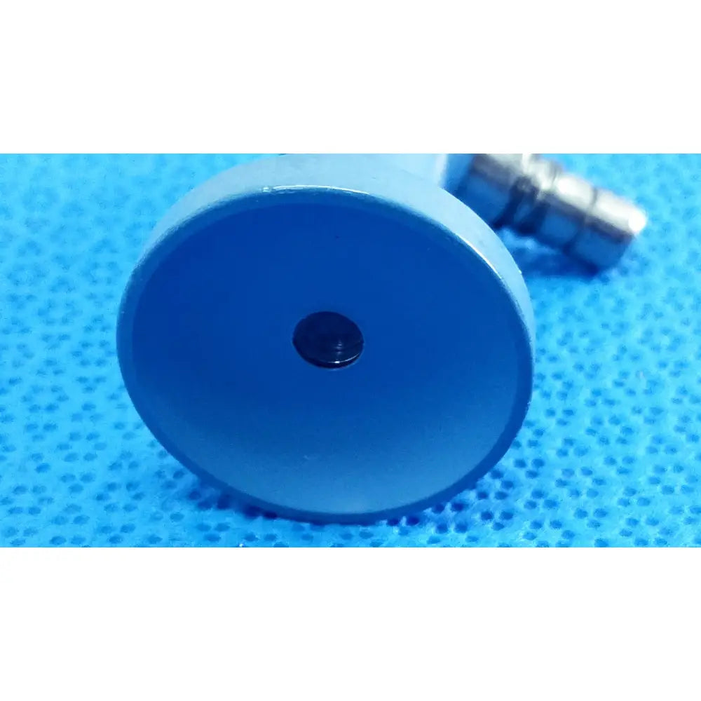 Blue circular plastic component with central black hole and metallic connector for stryker ideal eyes 5mm endoscope