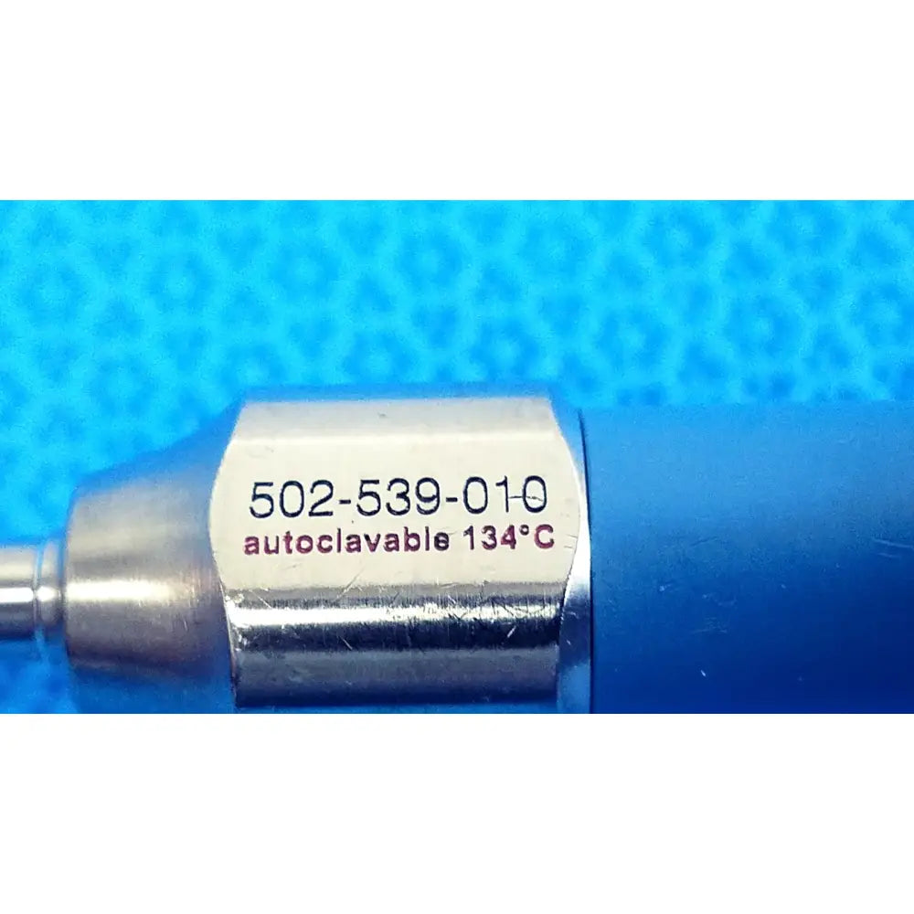 Silver metallic cylindrical stryker ideal eyes 5mm autoclavable endoscope with blue plastic housing and engraved label