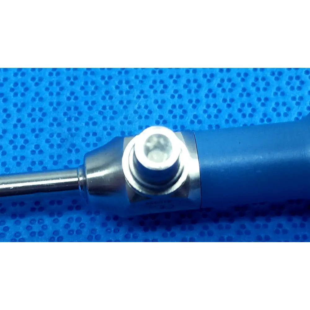 Blue-handled soldering iron with metallic tip and silver collar shown alongside stryker ideal eyes 5mm autoclavable endoscope