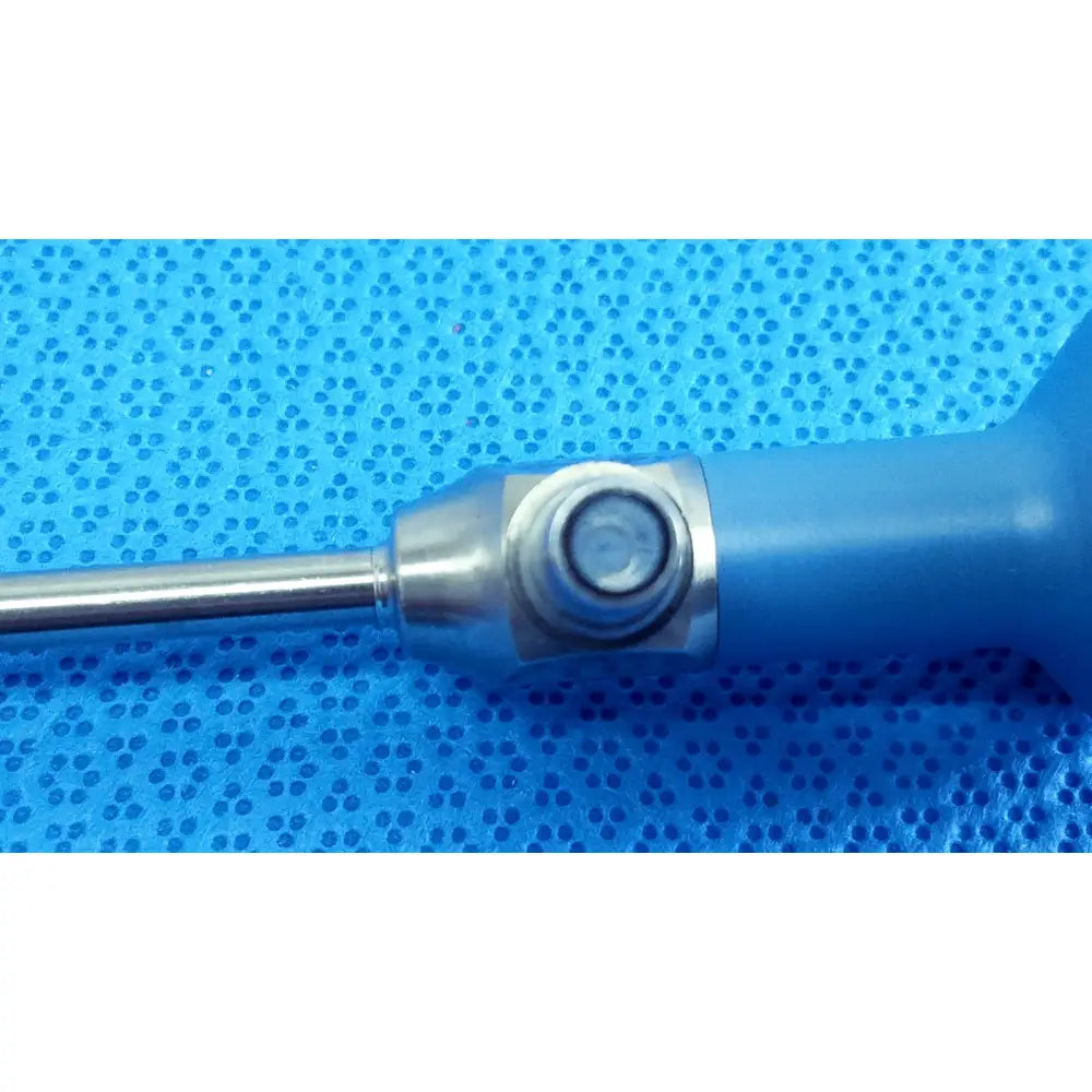 Blue-handled ideal eyes 5mm surgical instrument with metallic shaft and circular joint for endoscopic use by stryker