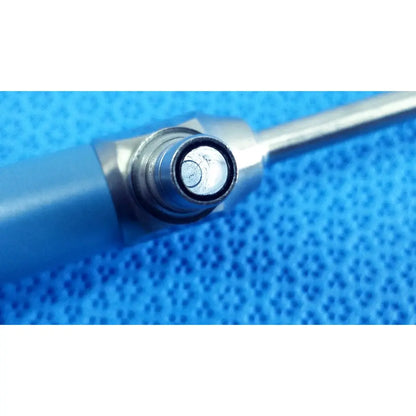 Silver-colored metallic surgical instrument with blue handle and circular tip of stryker ideal eyes 5mm endoscope