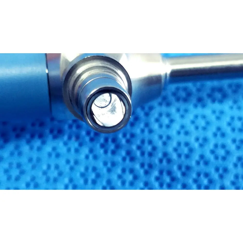Silver metallic dental drill bit with polished reflective tip and circular cutting edge for stryker ideal eyes 5mm endoscope