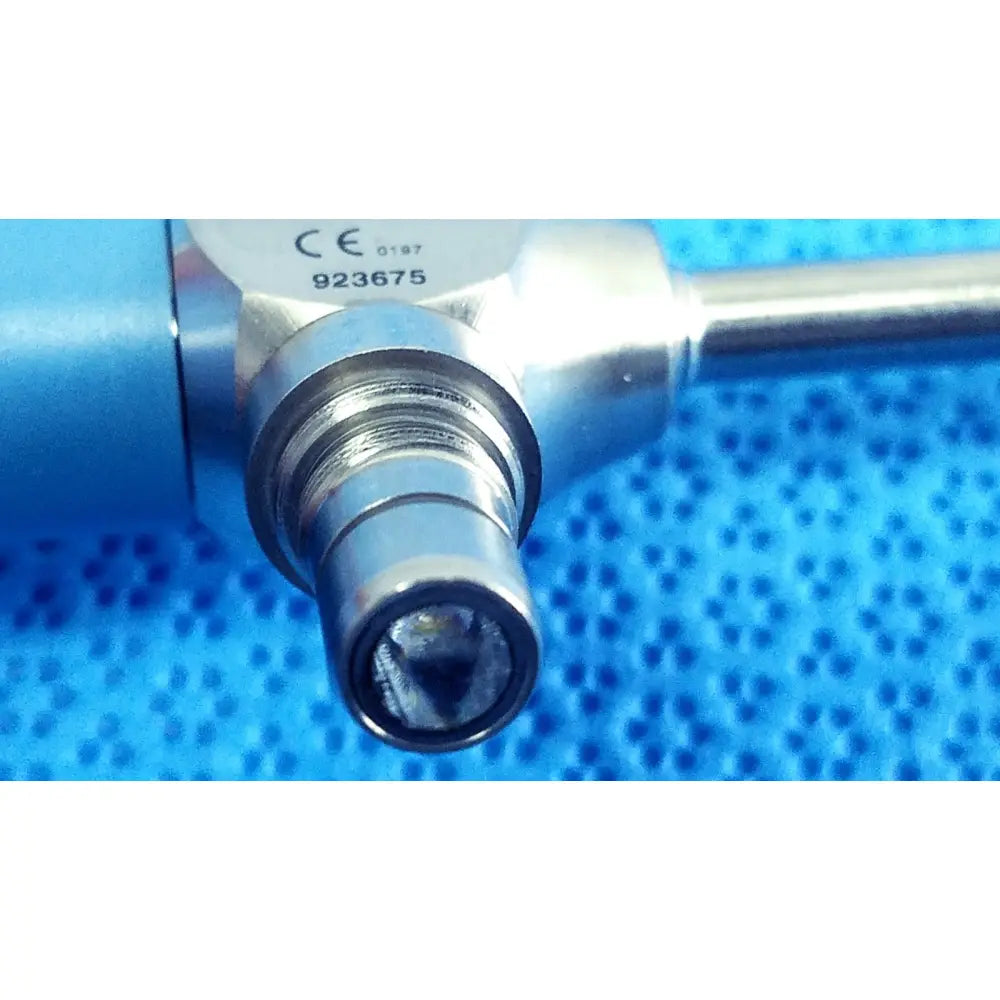 Silver surgical instrument with cylindrical threaded tip and blue handle for stryker ideal eyes 5mm endoscope