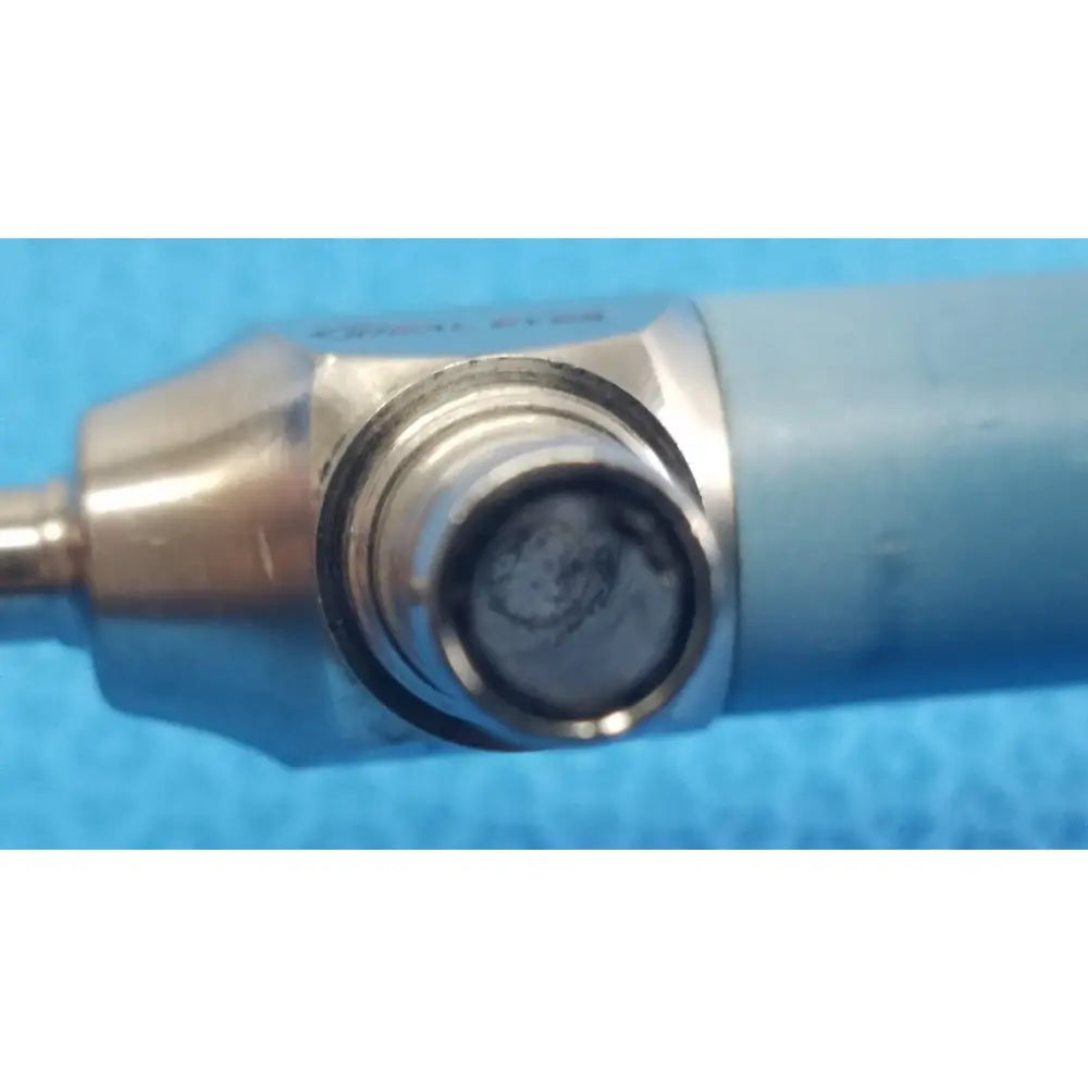 Blue-handled dental drill with metallic circular bit head and engraved markings from stryker ideal eyes 5mm endoscope
