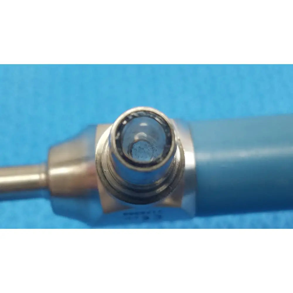 Silver-colored metal connector with clear circular lens at center of stryker ideal eyes 5mm 30 degree endoscope