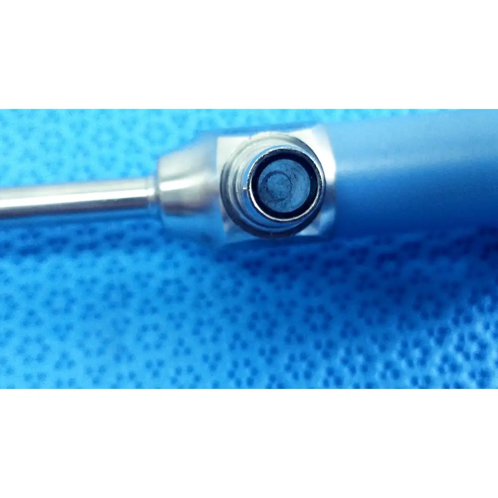 Blue-handled soldering iron with metallic tip and hexagonal collar alongside stryker ideal eyes 5mm autoclavable endoscope