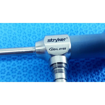 Stryker ideal eyes 5mm surgical endoscope with metallic silver housing and blue grip for precise medical use