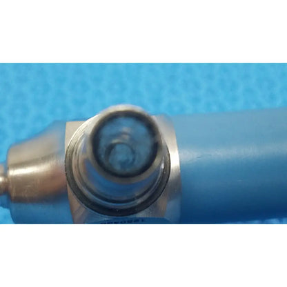 Blue cylindrical air compressor with metallic silver fittings and circular window for Stryker ideal eyes 5mm endoscope