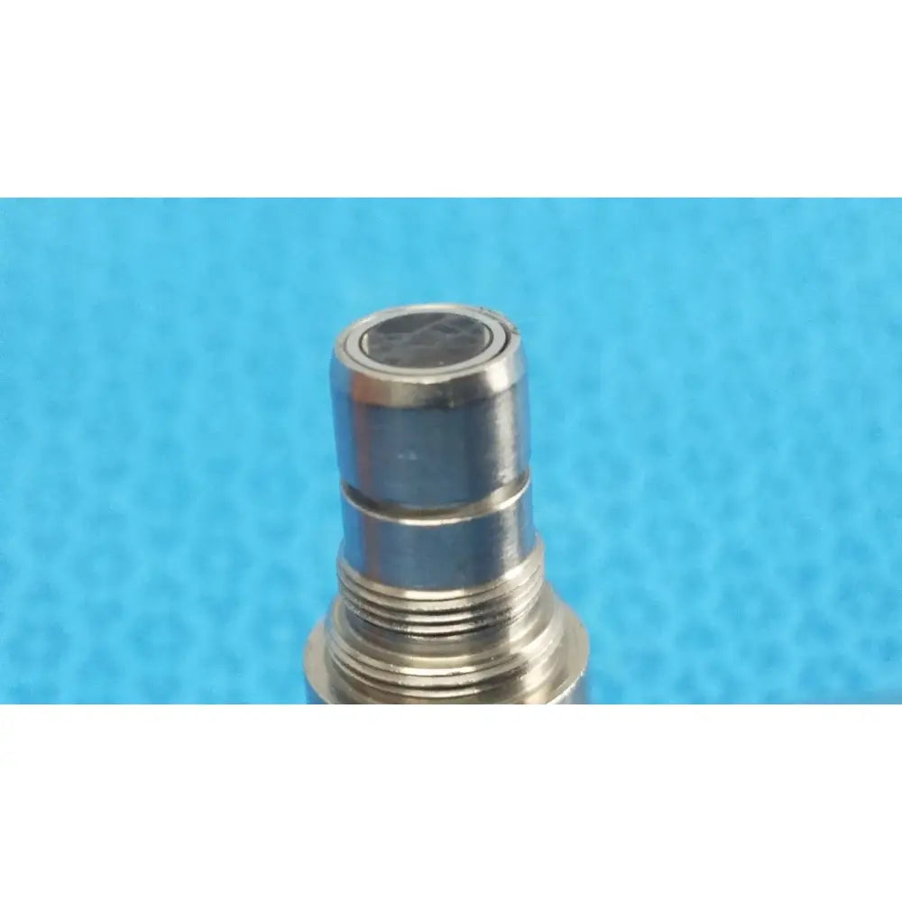 Silver metallic threaded connector with circular black top on stryker ideal eyes 5mm 30° autoclavable endoscope back side