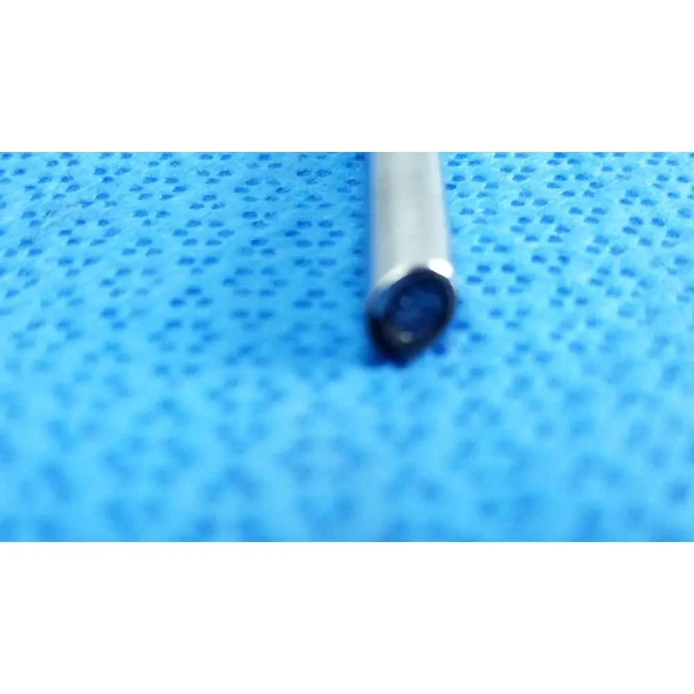A sleek metallic cylindrical ideal eyes 5mm 30 degree autoclavable endoscope with blackened tip on blue surface