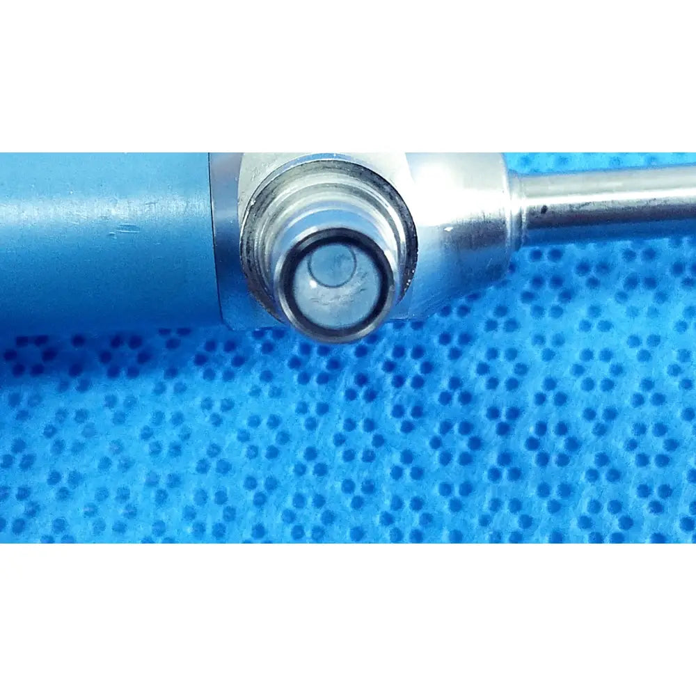 Blue cylindrical surgical instrument with metallic threaded tip and chrome finish for stryker ideal eyes 5mm endoscope