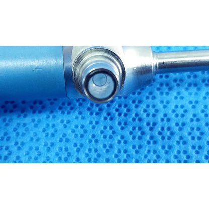 Blue cylindrical surgical instrument with metallic threaded tip and chrome finish for stryker ideal eyes 5mm endoscope