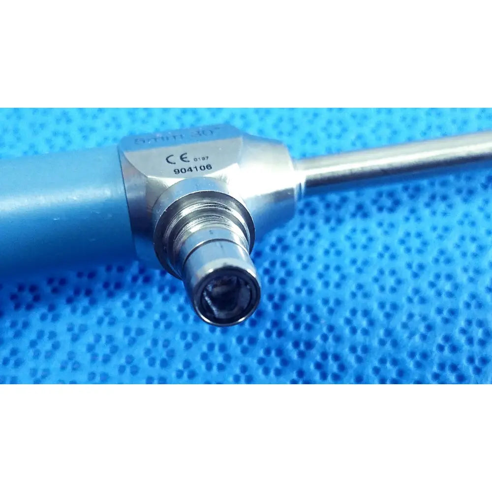 Silver surgical ideal eyes 5mm endoscope with blue handle metallic tip and engraved ce 0197 and 904106 markings