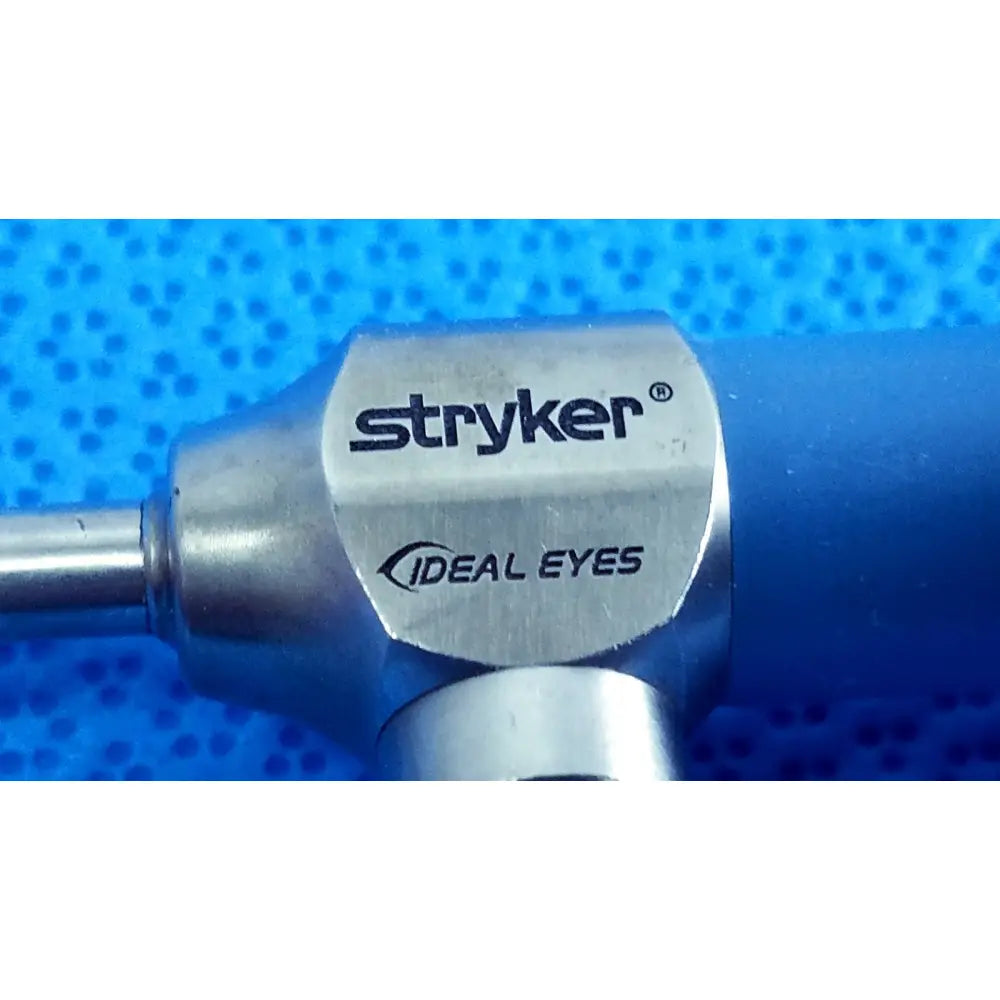 Silver stryker ideal eyes 5mm endoscope with brushed metal finish and blue plastic handle for surgical use