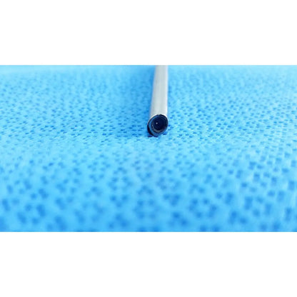 A slender metallic stryker ideal eyes 5mm 30 degree autoclavable endoscope with dark lens on blue textured surface
