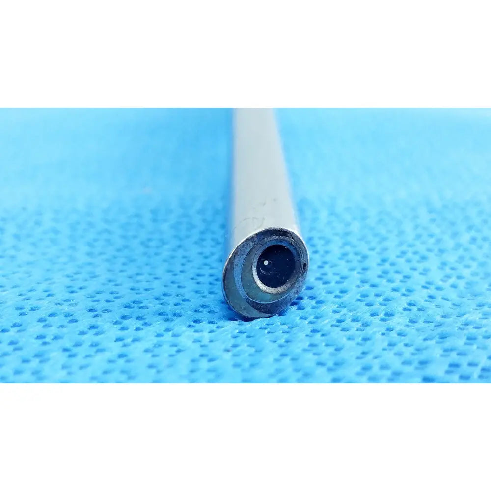 Silver-colored cylindrical stryker 10mm 30° autoclavable endoscope with circular lens and autoclavable design