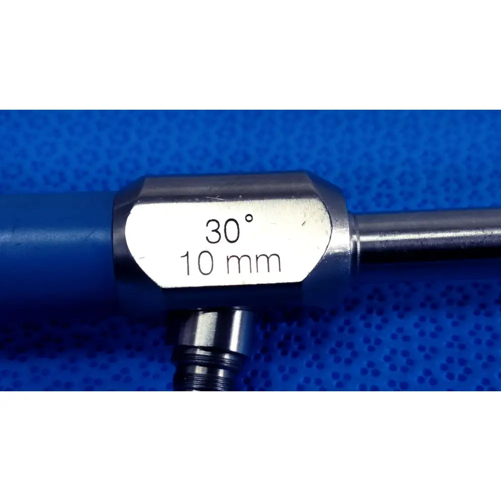 Silver metallic stryker 10mm 30° autoclavable endoscope with blue handle and engraved label for surgical use