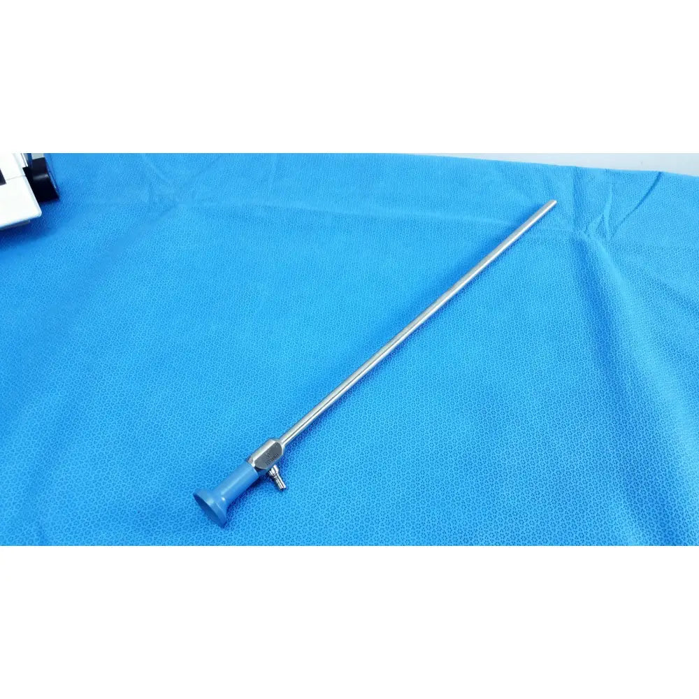 Silver stryker 502-557-030 10mm 30° autoclavable endoscope with blue handle and metallic shaft for surgical use