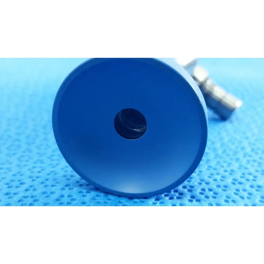 Blue circular metal component with central hole for stryker 502-557-030 10mm 30° autoclavable endoscope