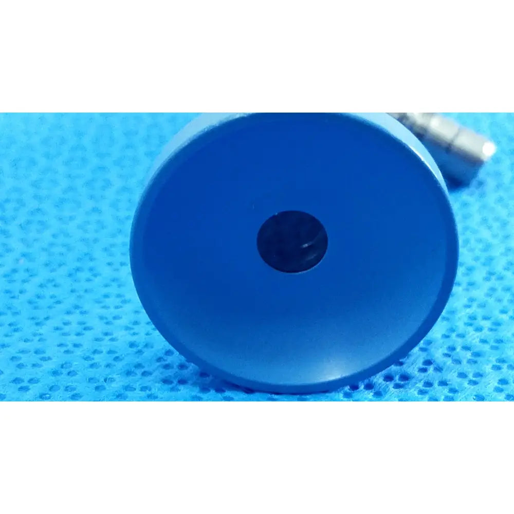 Blue cylindrical magnetic base with central hole for stryker ideal eyes 10mm autoclavable endoscope use