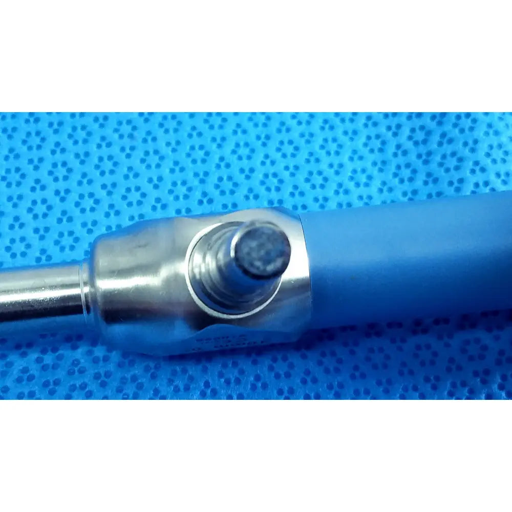 Blue-handled surgical instrument with metallic joint and threaded component from stryker ideal eyes 10mm endoscope