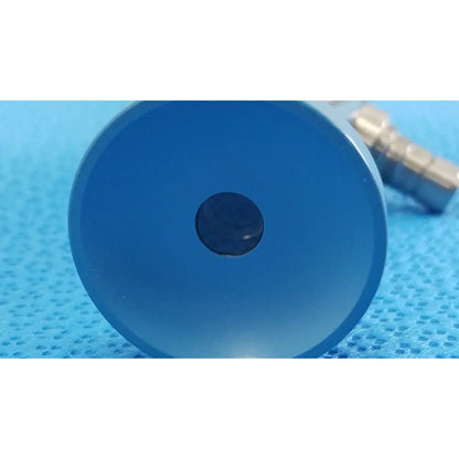 Blue circular plastic component with central hole for Stryker ideal eyes 10mm autoclavable endoscope accessory