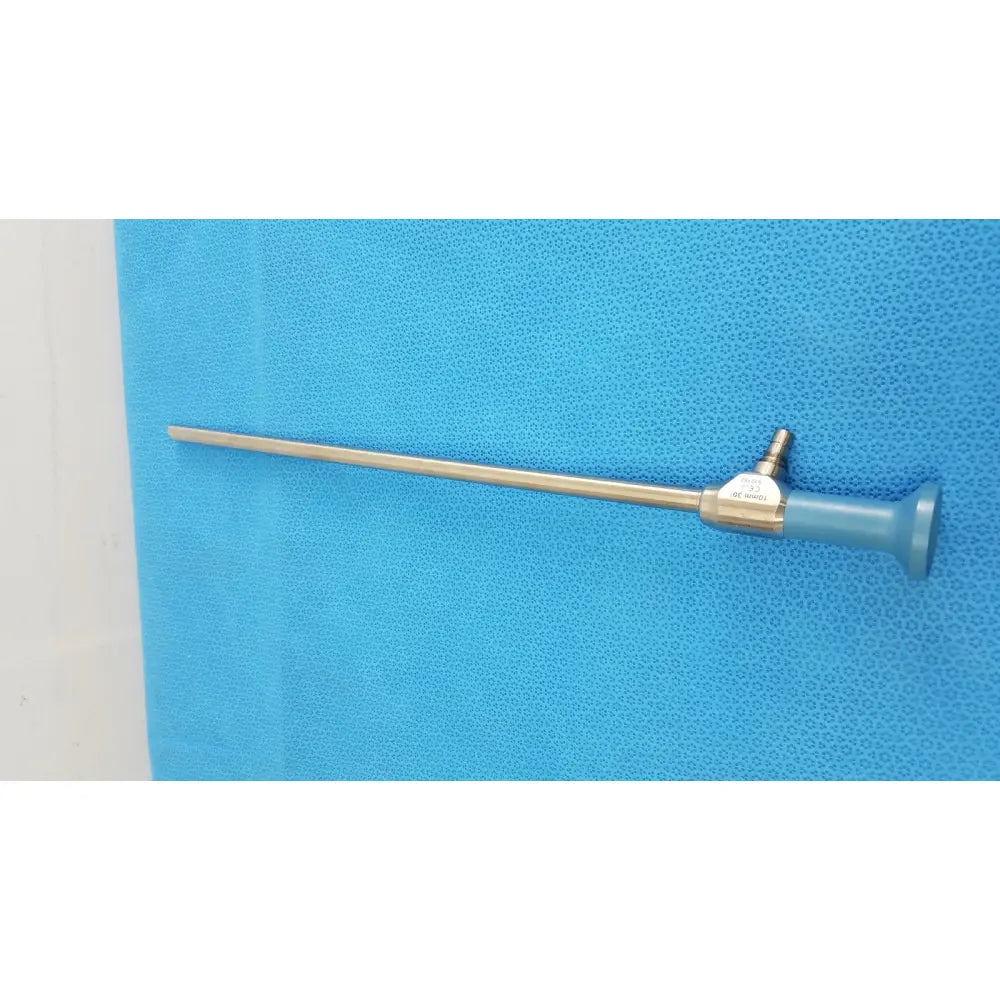 A metallic ideal eyes 10mm surgical endoscope with a blue ergonomic handle and polished slender shaft by stryker