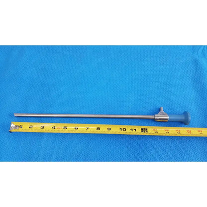 Silver surgical endoscope with blue ergonomic handle and metallic shaft beside yellow tape measure for ideal eyes 10mm use