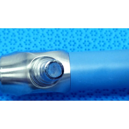 Blue cylindrical pen with metallic silver clip and threaded cap shown alongside stryker ideal eyes 10mm autoclavable endoscope