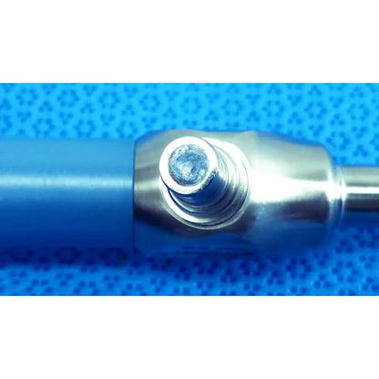 Blue cylindrical handle with metallic threaded connector and circular cap of stryker ideal eyes autoclavable 10mm endoscope