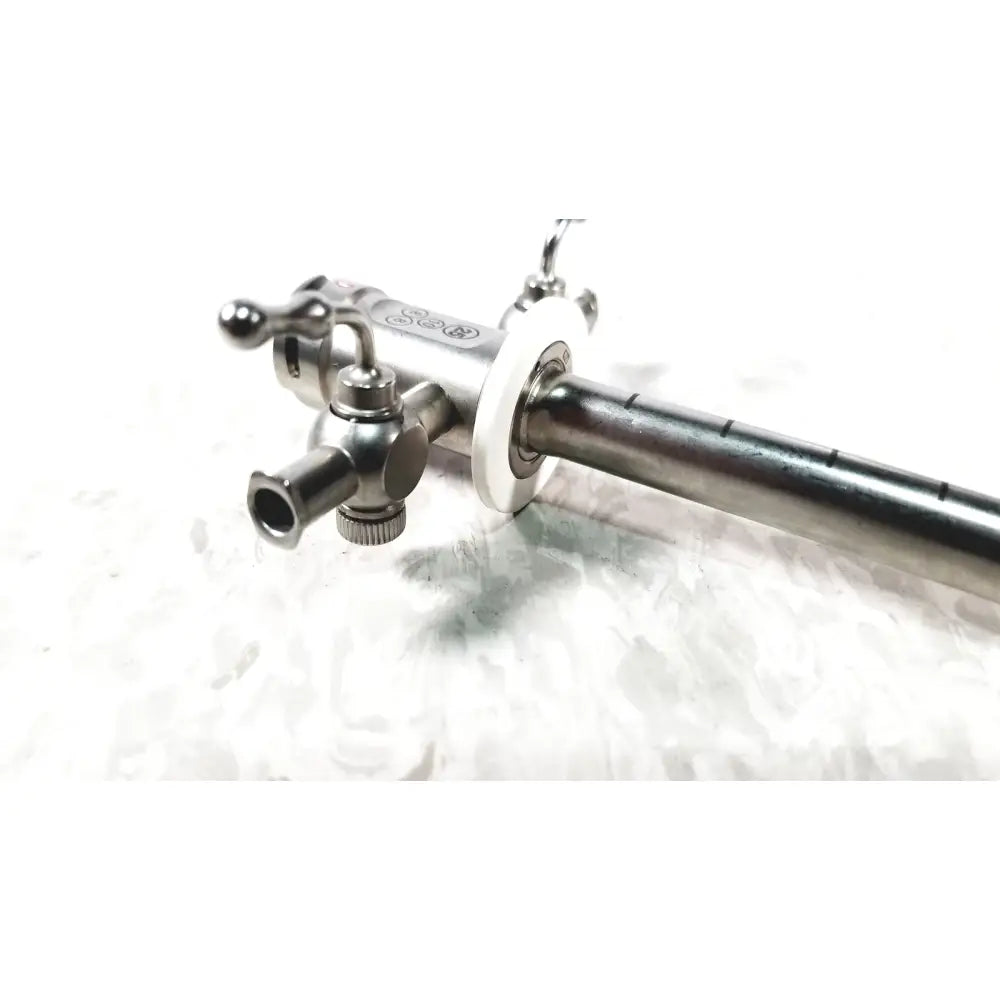 Stainless steel stryker scope sheath 25fr instrument with polished metallic finish and engraved markings on body