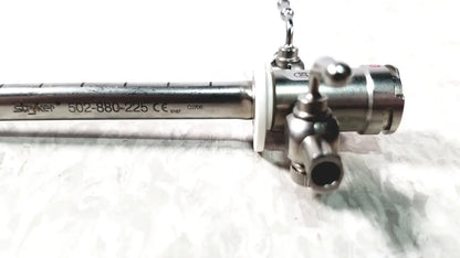 Stryker scope sheath 25fr instrument with metallic silver body engraved markings and control knobs visible on front side