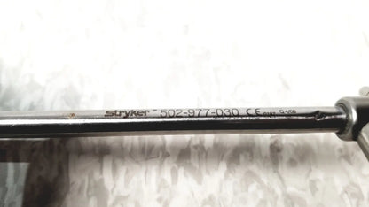 Black metal hysteroscopy diagnostic sheath with engraved stryker branding model number 502-977-030 for reuse medical use