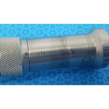 Silver metallic stryker series straight micro drill with knurled grip and engraved run series 100 markings