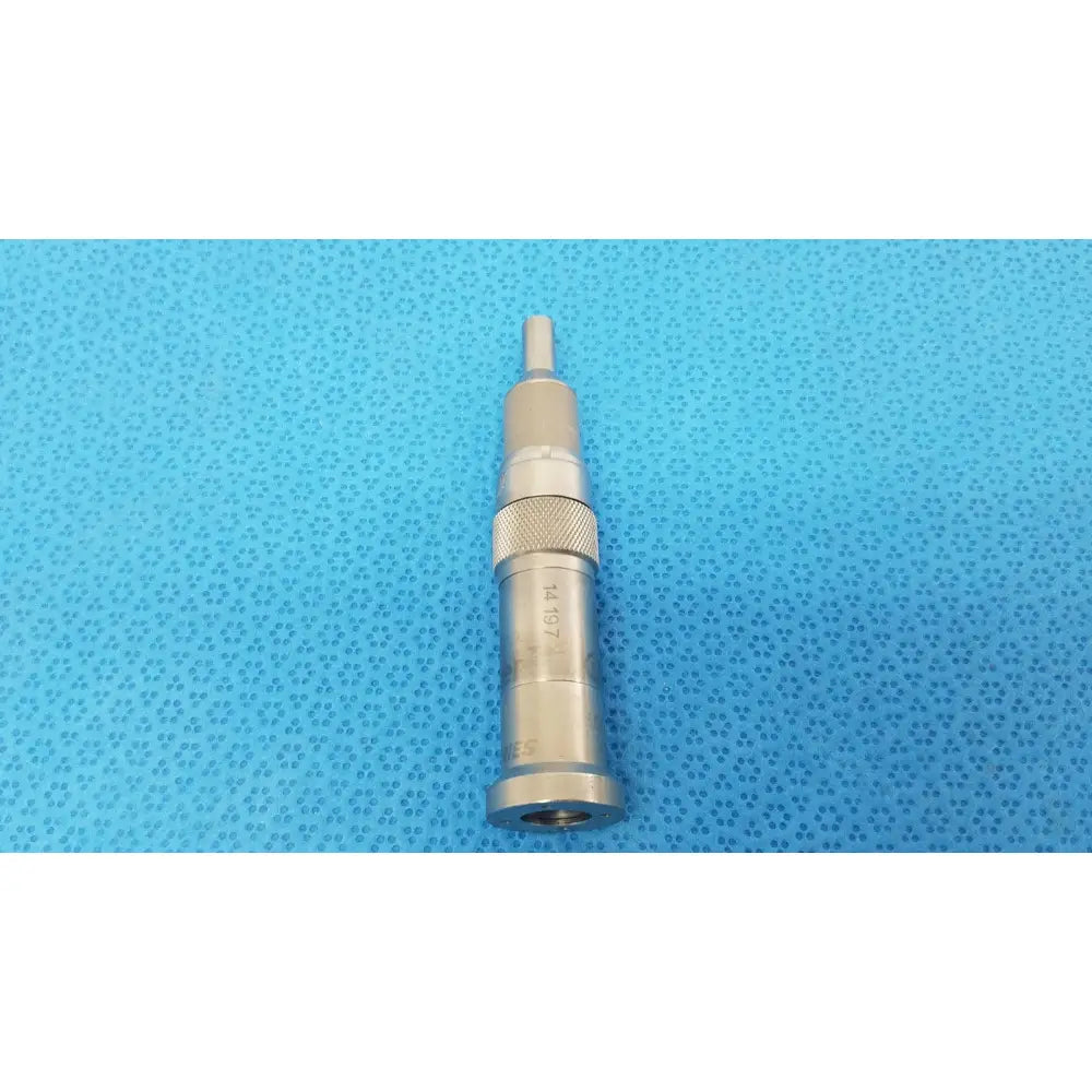 Silver-colored metal series straight micro surgical drill with textured grip and engraved markings for orthopedic use
