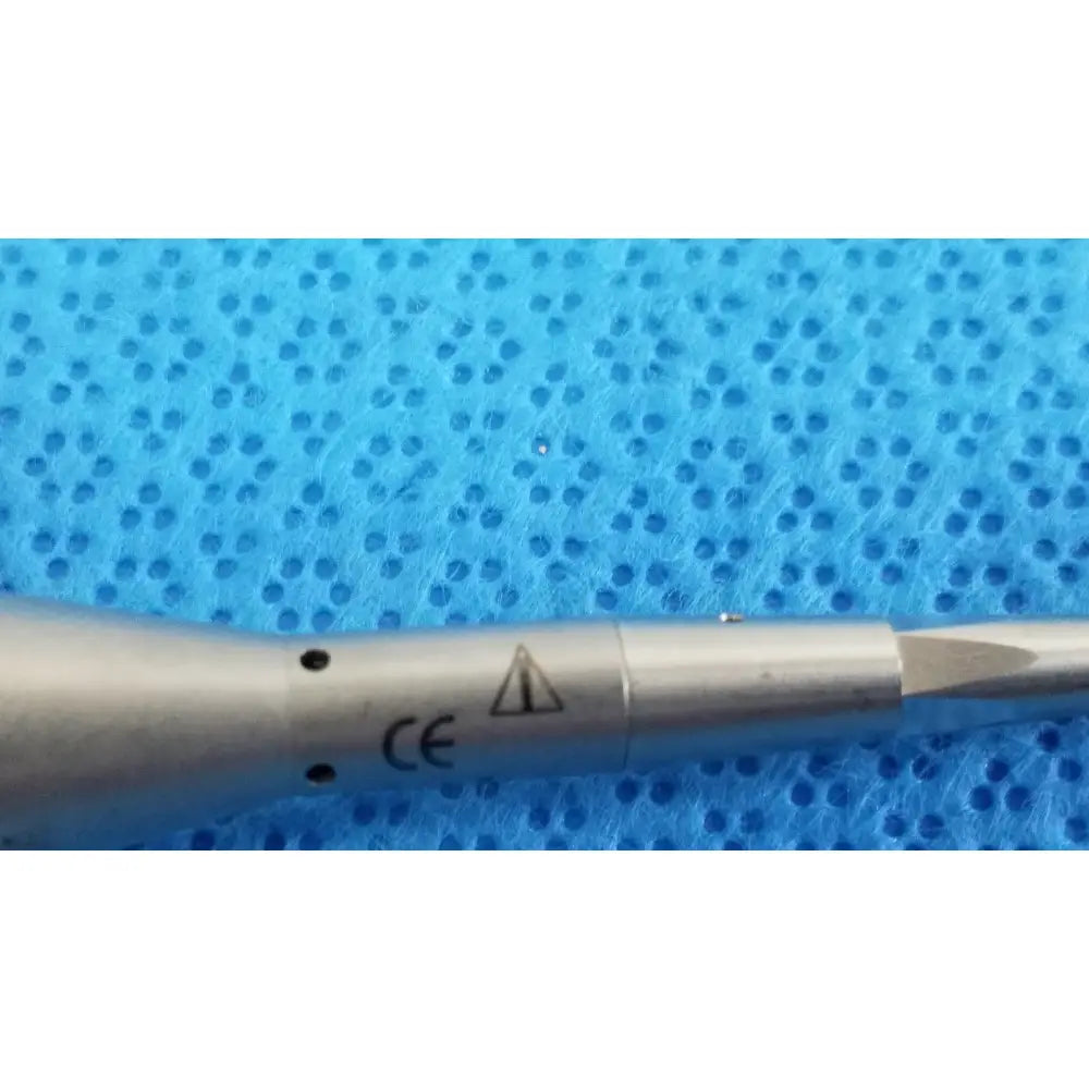 Silver surgical drill bit with sharp angled tip and ce marking on metallic shaft for stryker series angled saber chuck
